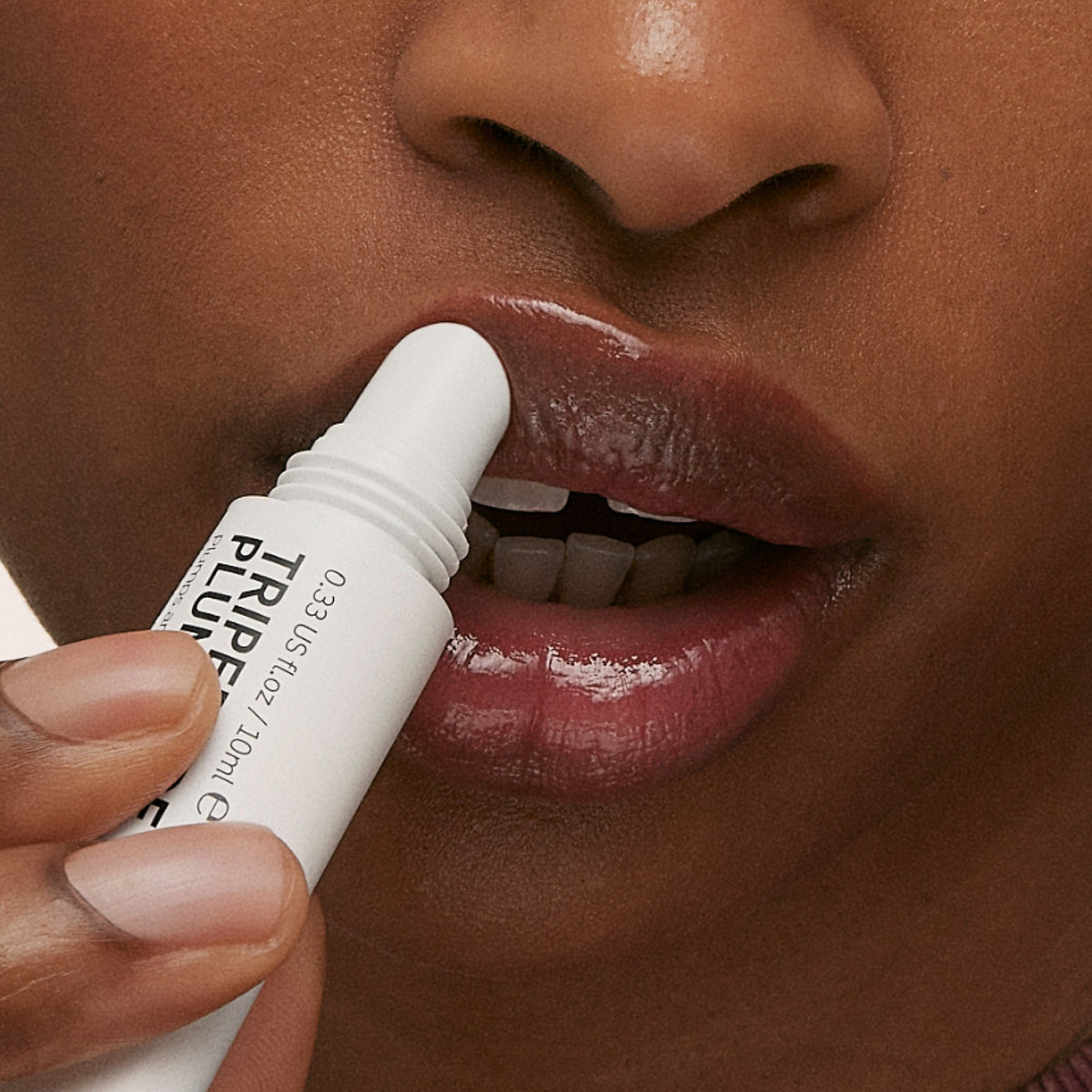 tripeptide-plumping-berry-lip-balm-d7 ApplicationBerry.jpg